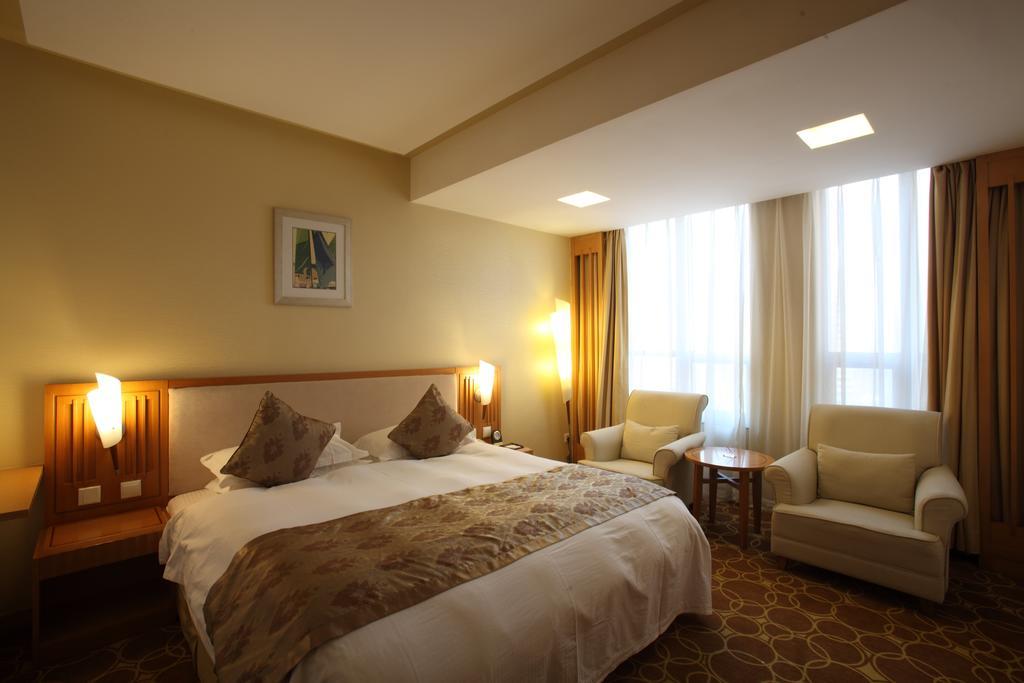 Beijing Wuhuan Hotel Habitación foto
