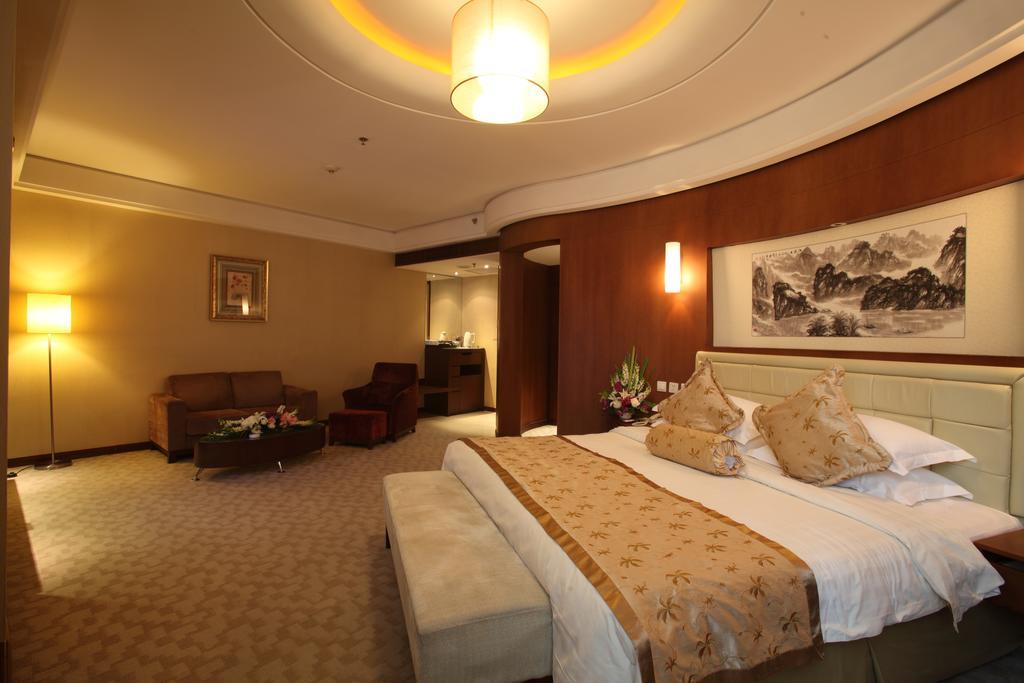 Beijing Wuhuan Hotel Habitación foto
