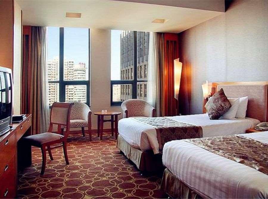 Beijing Wuhuan Hotel Habitación foto